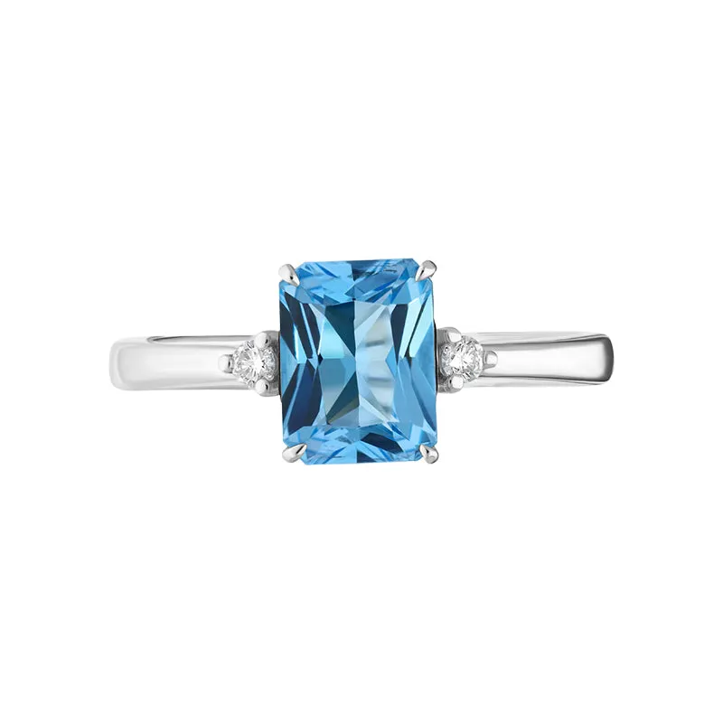 18ct White Gold Blue Topaz Diamond Emerald Cut Three Stone Ring