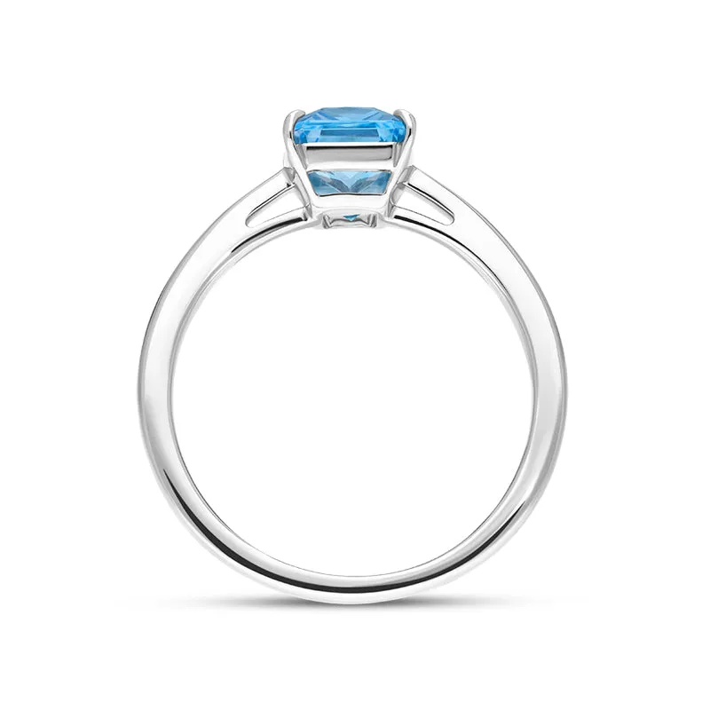 18ct White Gold Blue Topaz Emerald Cut Solitaire Ring D