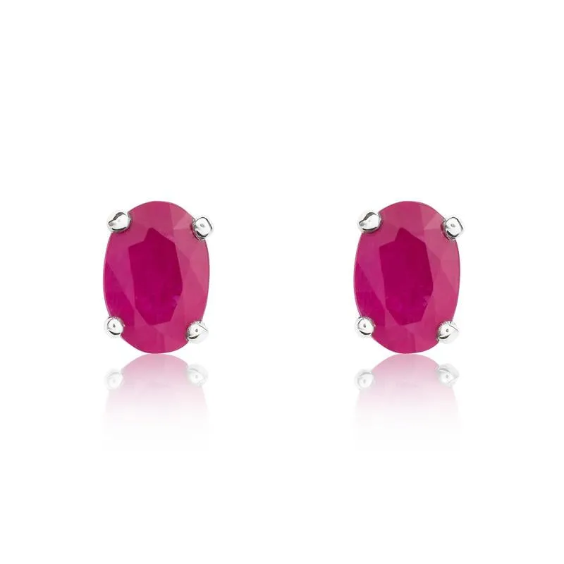 9ct White Gold Ruby 6x4mm Oval Claw Set Stud Earrings