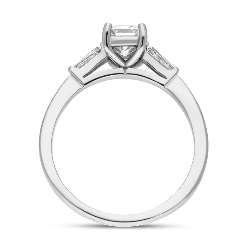 Platinum Diamond Emerald and Tapered Baguette Cut Three Stone Ring