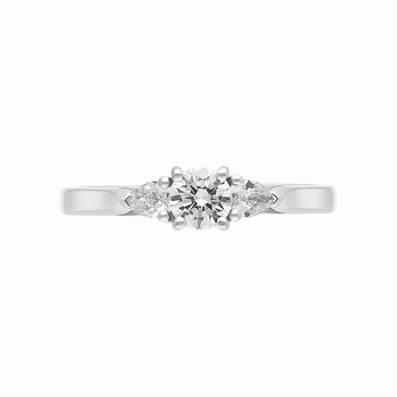 Platinum 0.46ct Diamond Round Brilliant and Pear Cut Three Stone Ring