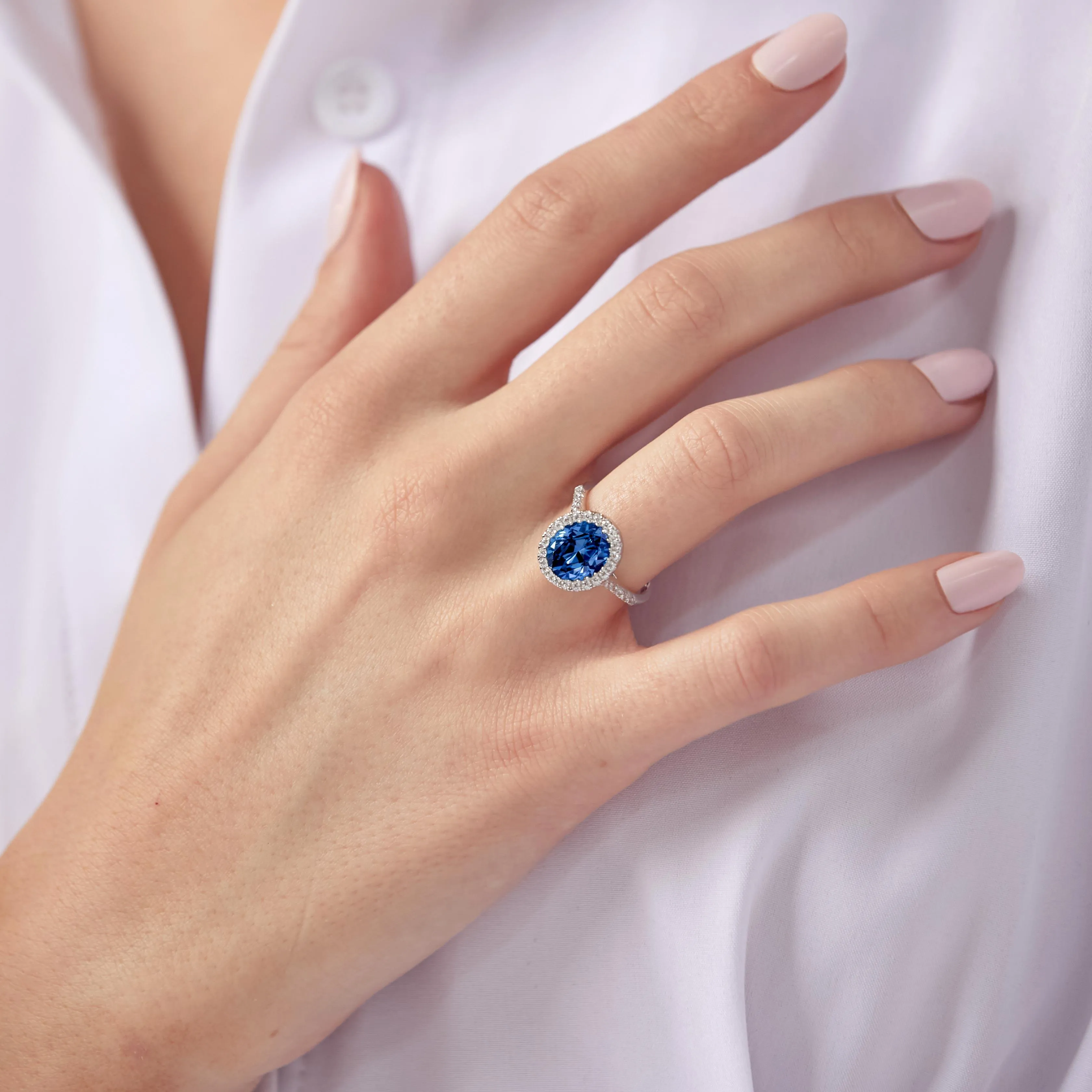 Silver 925 Rhodium Plated Blue Oval Halo Ring with CZ Stones - GMR00099S